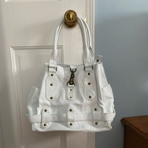 New! White patten leather bag with brass details.
